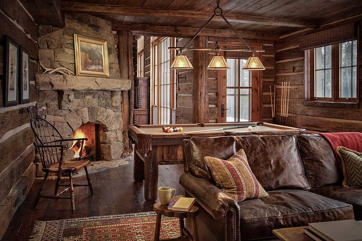 Customized log cabin living room with a pool table