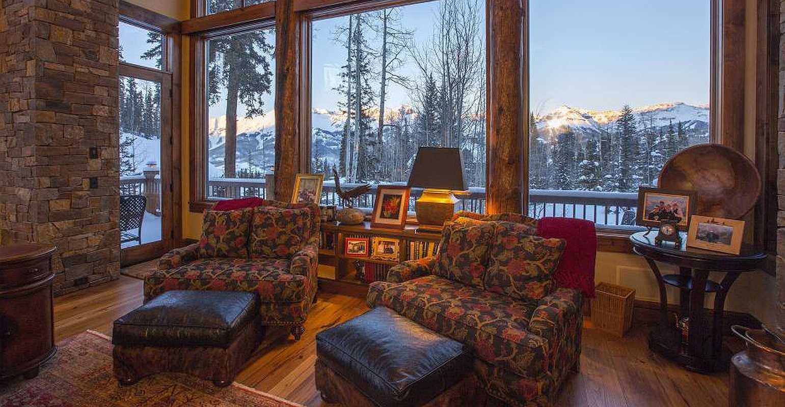 Log home with beautiful windows in the winter