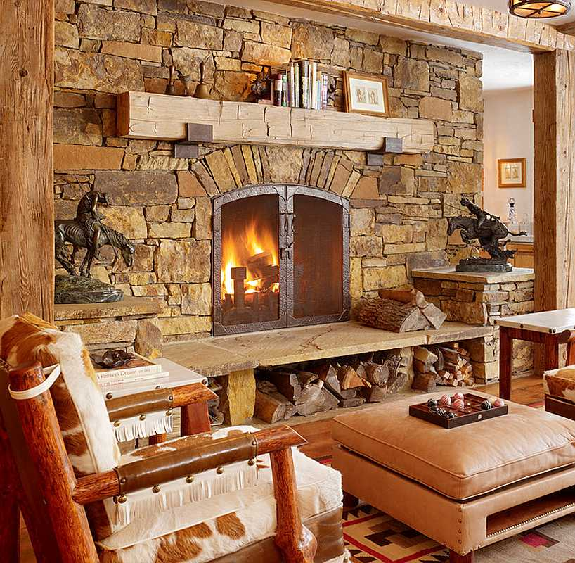 Beautiful lit fireplace in a custom log home