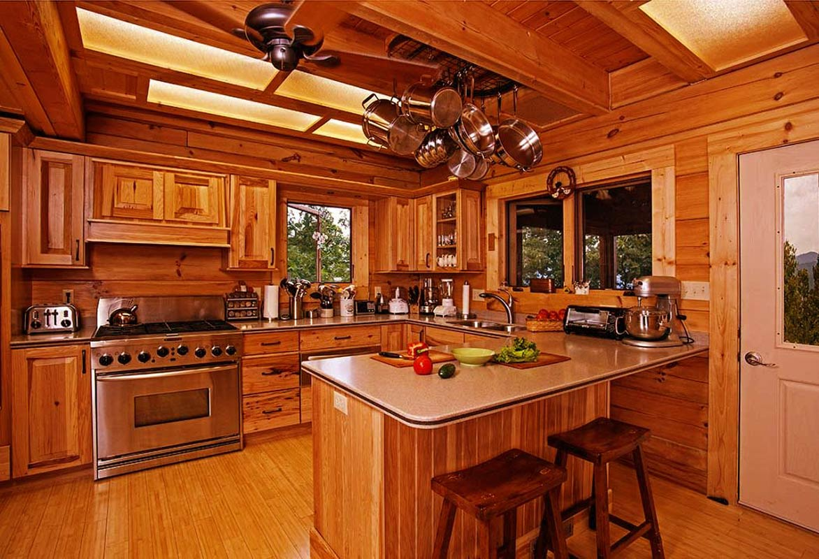 Kitchen in a small log cabin design